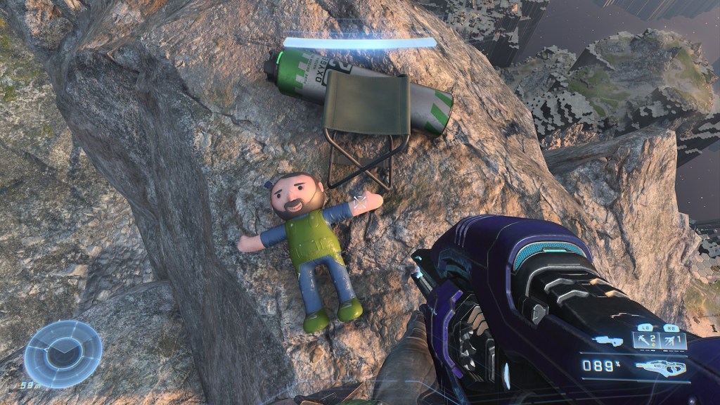 An image depicting a small action figure easter-egg found on top of a mountain.