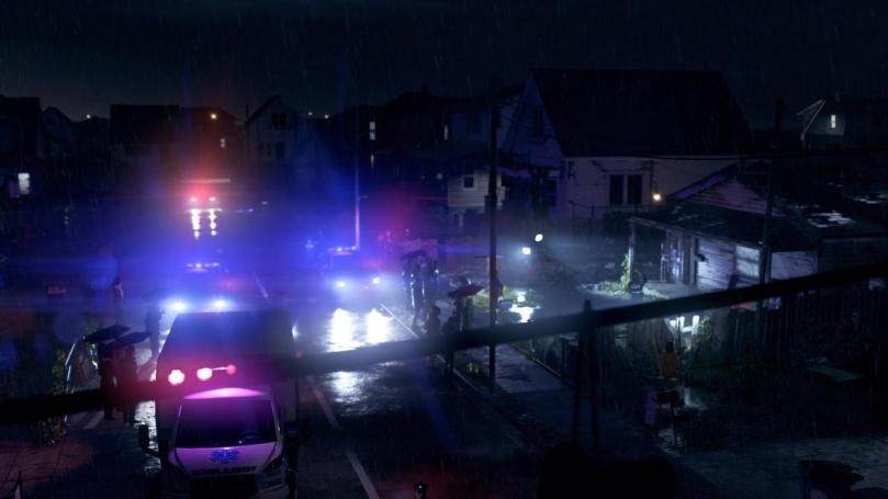Screenshot showing a crime scene in front of a house during a rainy night with police car and ambulance blue and red lights moodily illuminating the scene.