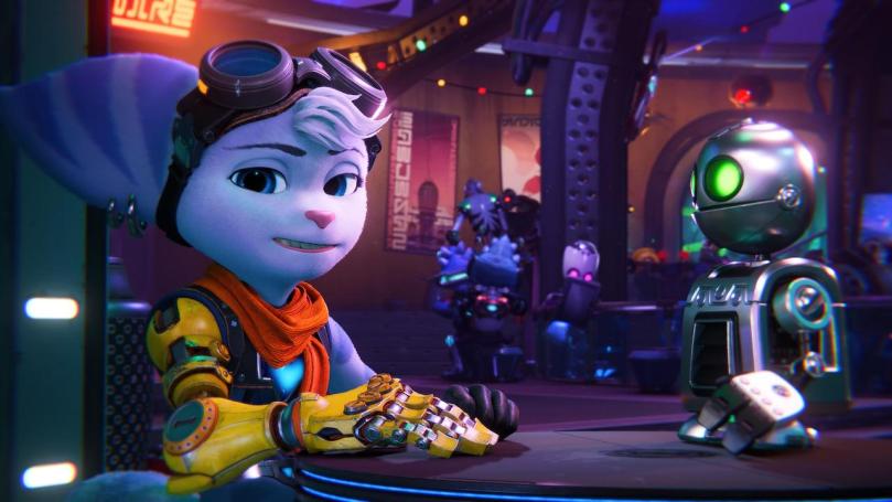 Screenshot showing Rivet and Clank sitting in a corner in a bar with Clank standing on the table, loking nice and raytraced shiny.